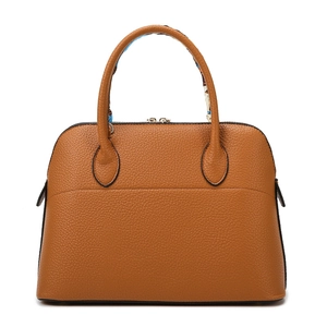 Classic tan shell tote bag with pebble leather texture and decorative blue scarf handle
