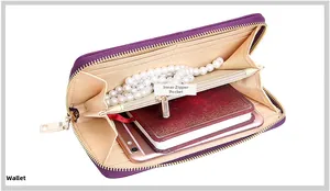 Macro detail of purple long wallet interior with card slots and a center zipper pocket