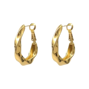French retro style twisted gold hoop earrings with high-polished metallic finish
