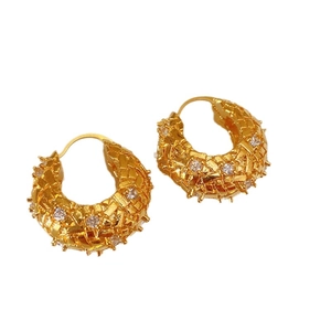 French retro gold-toned C-shaped hoop earrings with woven texture and zircon inlay