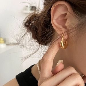 Minimalist 18K gold plated U-shaped hoop earrings for women with a glossy waterdrop design