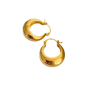 Boucles d'oreilles créoles épaisses plaquées or 18 carats au style métal minimaliste