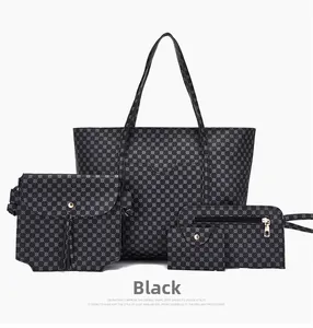 Dettaglio del set 4 pezzi borsa nera con motivi geometrici e finiture in metallo dorato