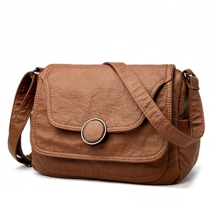 Classic dark brown pebble leather crossbody bag with a round gold metal buckle closure