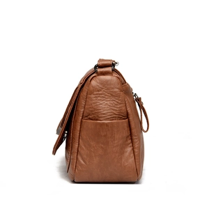 Brown vintage soft faux leather shoulder bag with side pocket and pebble texture