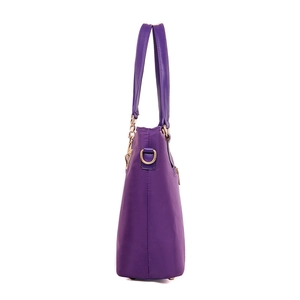 Fashionable purple nylon tote bag with shoulder straps shown in a side-view studio shot