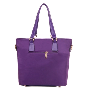 Purple nylon tote bag with golden hardware and adjustable strap for daily commute