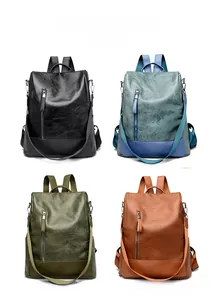 Four stylish contrast color backpacks in black, blue, olive, and brown color options