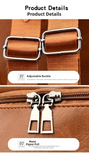 Detail of silver metal hardware dual zippers and adjustable strap on a brown leather bag