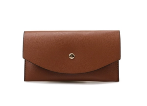 Close-up of brown litchi grain leather clutch bag with curved flap and gold metal clasp