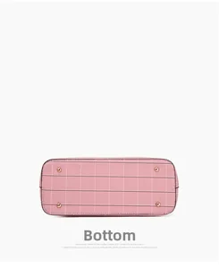 Vue du fond du sac à main à carreaux roses avec quatre pieds métalliques dorés fins