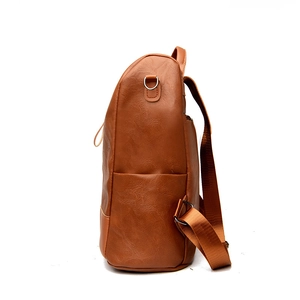 Brown contrast leather backpack with large capacity and durable nylon shoulder straps
