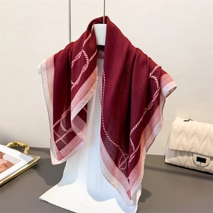 Minimalist burgundy silk-feel square scarf with classic rope pattern and striped border