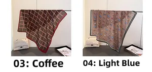 Detail view of coffee and light blue patterned fashion scarves with vintage horse prints