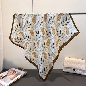 Elegant cream paisley cotton-linen scarf with floral patterns and dark brown border
