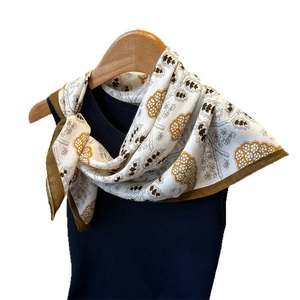 Elegant herringbone cotton-linen feel silk scarf with vintage bohemian pattern on hanger