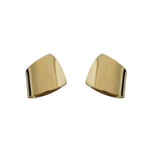 Macro detail of geometric 18K gold plated shield earrings with smooth metallic finish