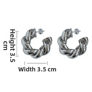 Detailed size view of silver twisted C-hoop earrings measuring 3.5cm height and width