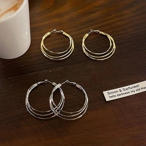 Boucles d'oreilles créoles à trois couches plaquées or 18 carats et argent massif