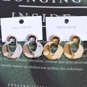 Orecchini a cerchio intrecciati geometrici in oro e argento con perno in argento S925