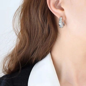 Silver strawberry texture C-shaped earrings with unique molten metal finish for women