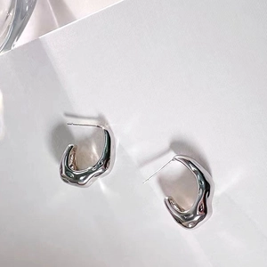 Silver liquid lava earrings with irregular water drop design and polished mirror finish