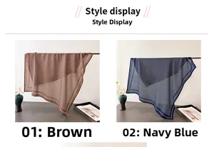 Close-up of brown and navy polka dot cotton-linen scarves displayed on a table