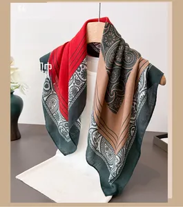 Close-up of multicolor paisley print scarf with red and green geometric textures