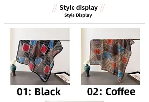 Close-up of black and coffee paisley printed square scarves in soft silk-like fabric