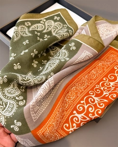 Detail of paisley print cotton linen square scarf in olive green, grey and orange