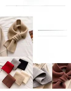 Detail of soft knit texture and cross-through style on stylish solid winter scarves