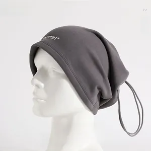 Detail of dark grey fleece neck warmer with adjustable drawstring on a mannequin