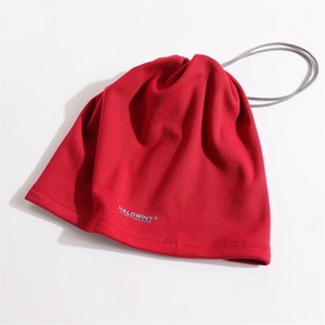 Close-up of red fleece neck gaiter with adjustable drawstring and HALOWINT branding