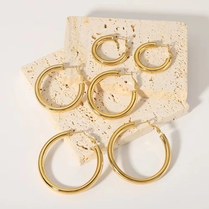 Three pairs of 18K gold plated hollow hoop earrings in small medium and large sizes