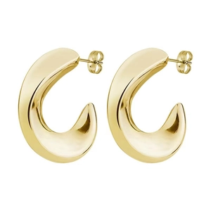 Macro detail of glossy gold-plated hollow C-shaped hoop earrings with mirror finish
