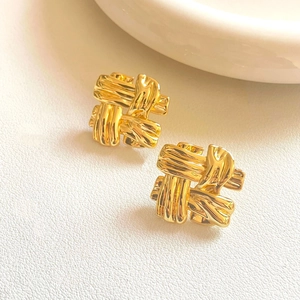 Golden textured stud earrings featuring a chic woven knot design in a warm metallic finish