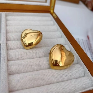 Minimalist 18K gold-plated heart-shaped hoop earrings with polished 3D metallic finish