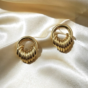 Chic 18K gold plated multi-layer hoop earrings displayed on premium satin fabric