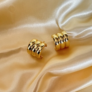 Minimalist C-shaped thick ribbed hoop earrings in 18K gold finish for women