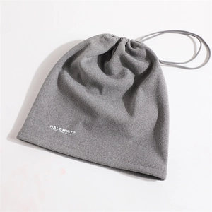 Detail view of dark grey fleece neck warmer with adjustable drawstring and logo print