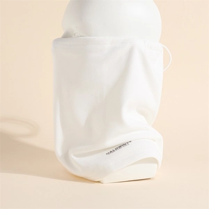 Close-up of white fleece neck gaiter with printed outdoor sports logo on soft knit fabric
