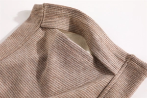 Detailed view showing the warm fleece lining and ribbed knit texture of the winter neck gaiter