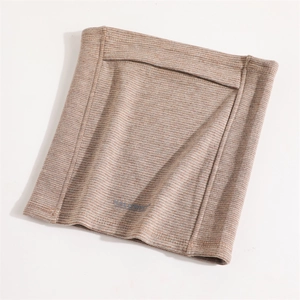 Detailed view of the fine knit texture and beige-brown stripes of the winter neck warmer