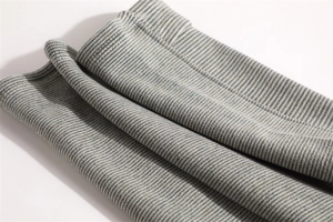 Detail shot of the breathable grey ribbed knit fabric used for thermal neck warmers