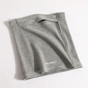 Detail of grey striped fleece neck warmer with breathable opening for outdoor sports