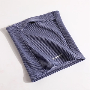 Detailed view of striped winter neck gaiter with warm fleece lining and logo