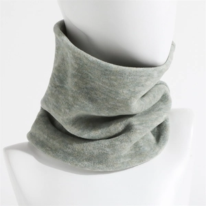 Close-up of soft knitted neck warmer in light grey-green with thermal fleece texture