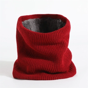 Detailed close-up of red knitted neck warmer with grey fleece lining for winter warmth