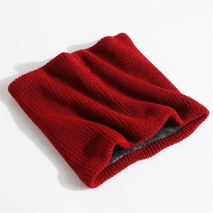 Detail of burgundy ribbed knit neck warmer with thick thermal fleece lining for winter