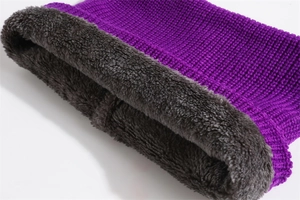 Close-up of the thick grey fleece lining and purple knitted fabric for thermal warmth